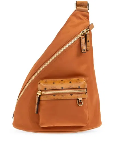 Mcm Aren Sling Backpack In Brown