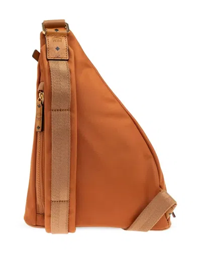 Mcm Aren Sling Backpack In Brown
