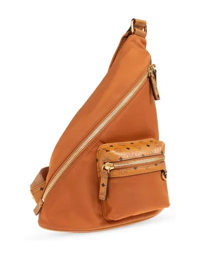 Mcm Aren Sling Backpack In Brown