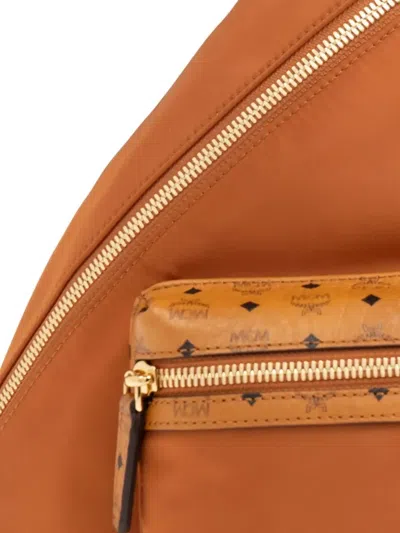 Mcm Aren Sling Backpack In Brown