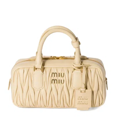 Miu Miu Zip Quilted Leather Top-handle Bag In Neutral