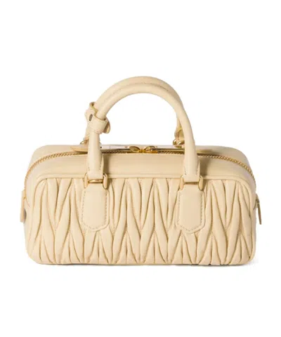 Miu Miu Zip Quilted Leather Top-handle Bag In Neutral