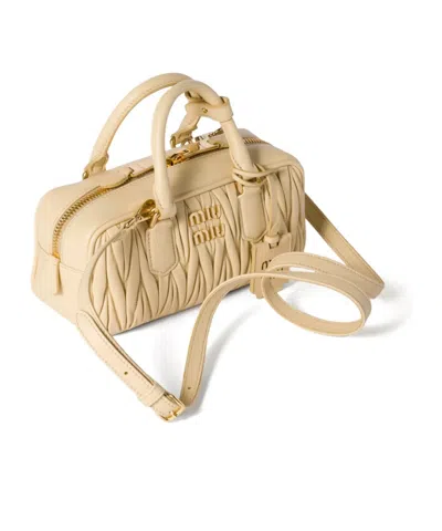 Miu Miu Zip Quilted Leather Top-handle Bag In Neutral
