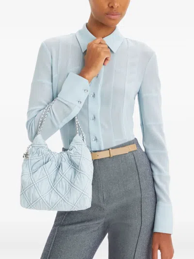 Tory Burch Fleming Mini Quilted Denim Hobo Bag In Blue