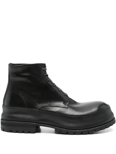 A Diciannoveventitre Leather Boots In Black