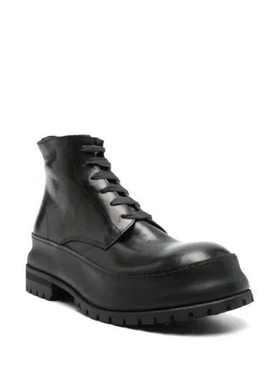 A Diciannoveventitre Leather Boots In Black