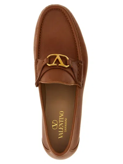 Valentino Garavani V-logo Embellished Full-grain Nubuck Loafers In Brown