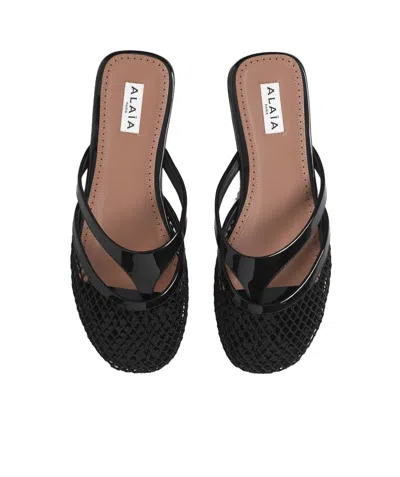Alaïa Fishnet And Leather Flip Flops Flat Mules Shoes In Black