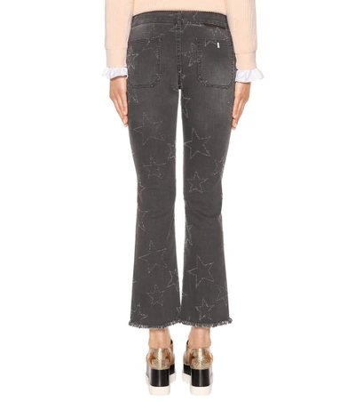 Shop Stella Mccartney Distressed Flared Jeans In Black