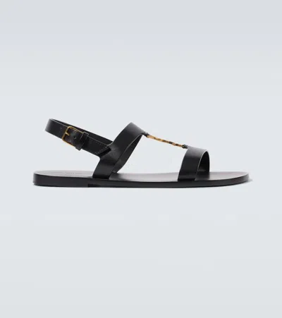 Saint Laurent Cassandra Logo Plaque Flat Sandals In Black