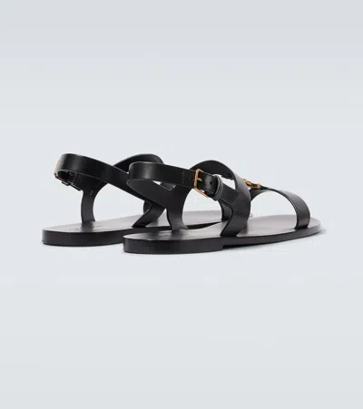 Saint Laurent Cassandra Logo Plaque Flat Sandals In Black