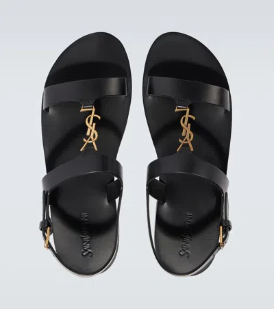 Saint Laurent Cassandra Logo Plaque Flat Sandals In Black
