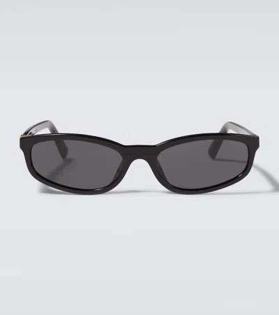 Miu Miu Ovale Sonnenbrille In Schwarz