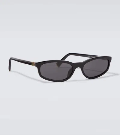 Miu Miu Ovale Sonnenbrille In Schwarz