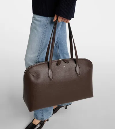 Totême Curved Leather Shopper Featuring Protective Base In Brown