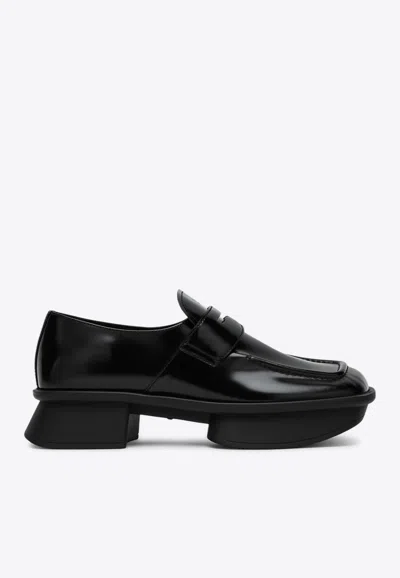 Prada Re-edition Equal Platform Penny Loafer In Nero