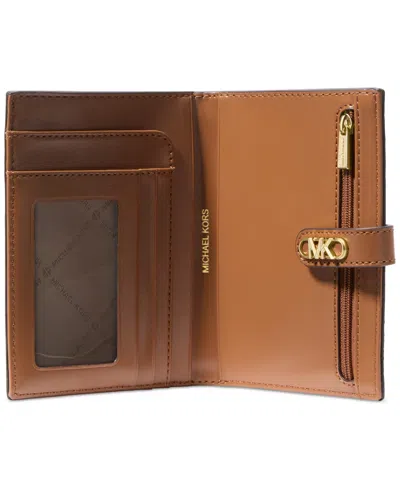 Michael Kors Michael  Empire Medium Tab Passport Wallet In Brown,acorn