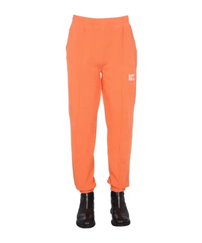 Helmut Lang Logo-print Tapered Joggers In Orange