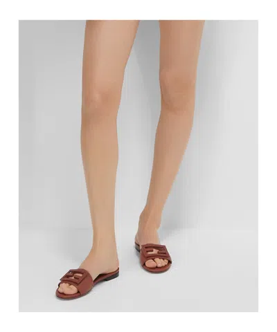 Fendi Baguette Leather Slides With Macro Selleria Topstitches In Brown