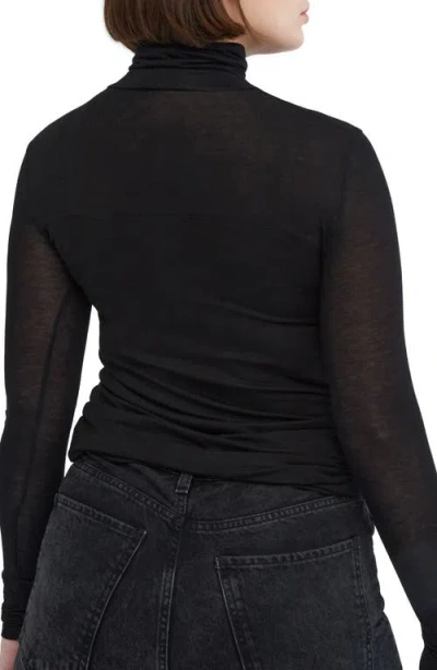 Marcella Sheer Panel Turtleneck Top In Black