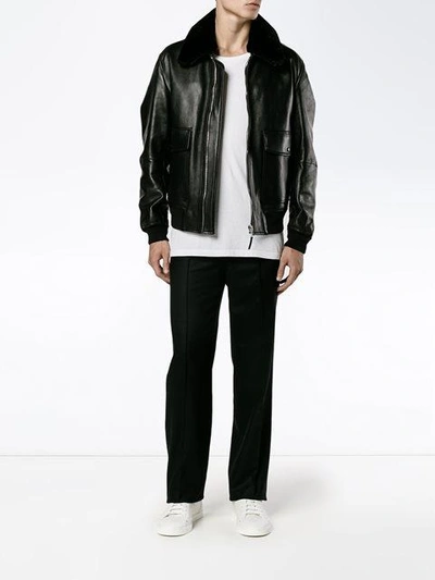 Shop Givenchy Raised Seam Trousers - Black