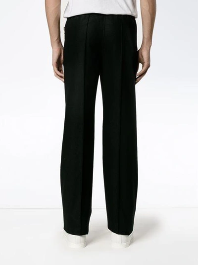 Shop Givenchy Raised Seam Trousers - Black