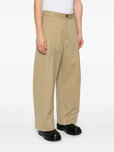 Studio Nicholson Pleat-detail Trousers In Beige