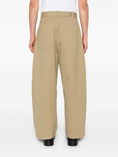 Studio Nicholson Pleat-detail Trousers In Beige