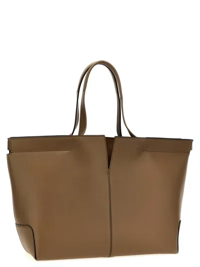 Tod's Hand Stitched Tote Bag In Beige