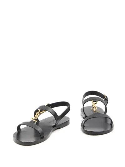 Saint Laurent Black Sandals With Metal Cassandre On The Front And Adjustable Strap In Leather Woman In Black