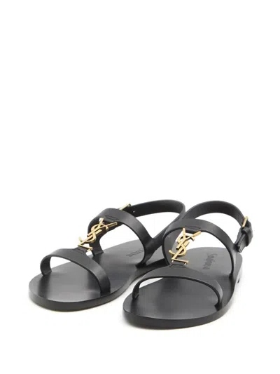 Saint Laurent Black Sandals With Metal Cassandre On The Front And Adjustable Strap In Leather Woman In Black