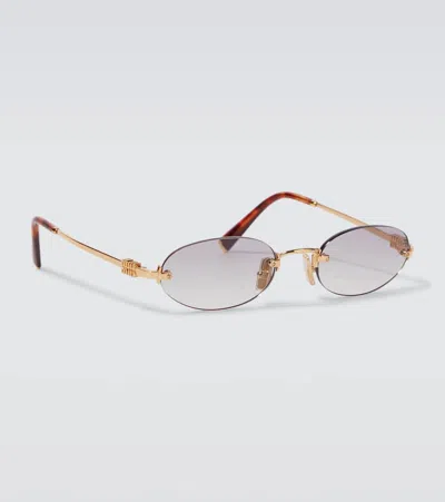 Miu Miu Oval Sunglasses In Gold