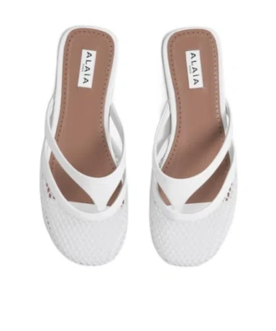 Alaïa Net Leather Thong Mules In White