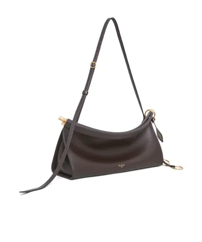 Alaïa Le Click Small Shoulder Bag In Glossy Leather In Black