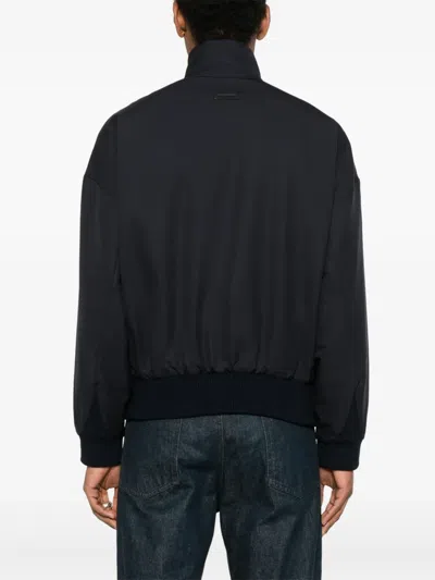 Fear Of God High-necked Jacket With Ribbed Cuffs And Hem In Blue