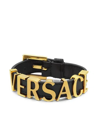 Versace Logo Lettering Bracelet In Noir+or