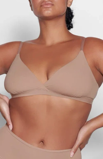 Skims Fits Everybody Wrap-effect Triangle Stretch Bralette In Sienna