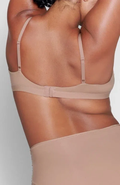 Skims Fits Everybody Wrap-effect Triangle Stretch Bralette In Sienna