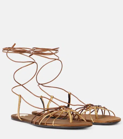 Saint Laurent Cassandre Leather Flat Strappy Sandals In Gold