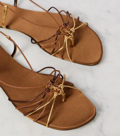 Saint Laurent Cassandre Leather Flat Strappy Sandals In Gold