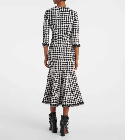 Alexander Mcqueen Mcqueen Midi Houndstooth Skirt With Flared Silhouette In Black