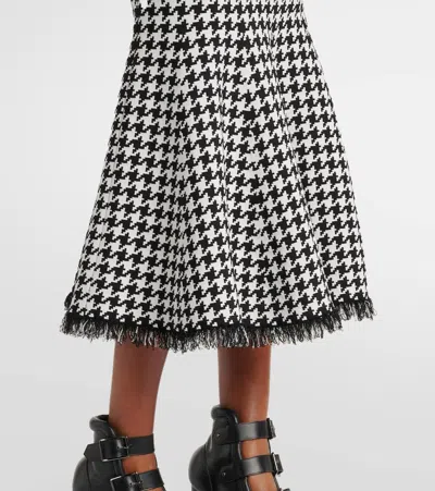 Alexander Mcqueen Mcqueen Midi Houndstooth Skirt With Flared Silhouette In Black