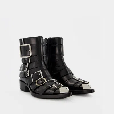 Alexander Mcqueen Punk Buckle Boots In Black