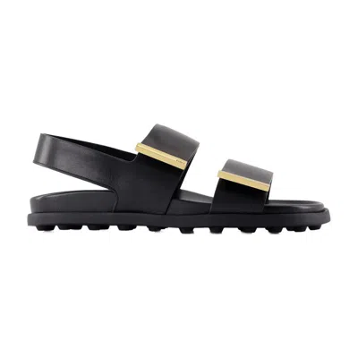 Shop Tod's Sandals In Black