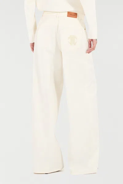 Roberto Cavalli Python-print Trousers In Ivory