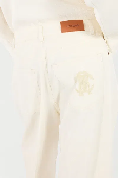 Roberto Cavalli Python-print Trousers In Ivory