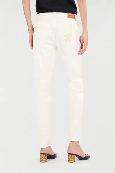 Roberto Cavalli Python-print Jeans In Ivory