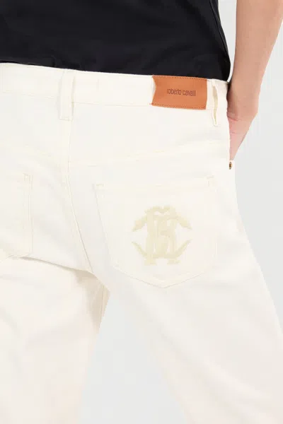 Roberto Cavalli Python-print Jeans In Ivory