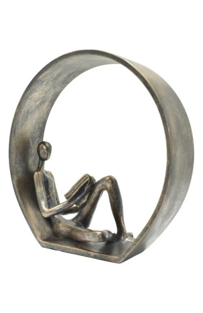 Kinetic Encircled Reader Sculpture In Pewter