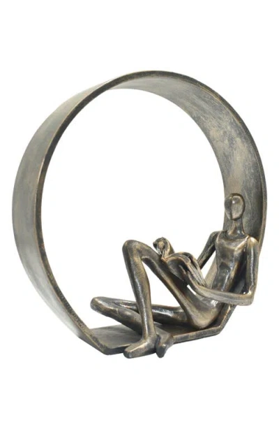 Kinetic Encircled Reader Sculpture In Pewter